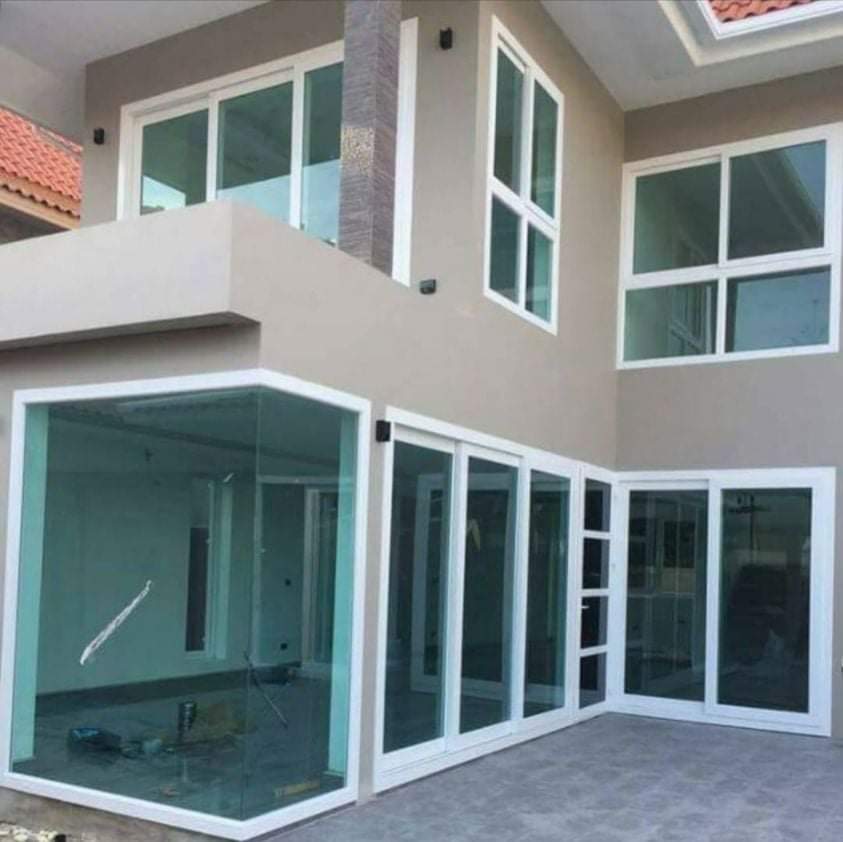 uPVC sliding glass door and window installation for modern residential home exterior